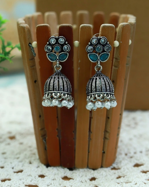 Indian oxidized silver Jhumka style earrings with mint stone studs and small pearl-like beads hanging at the bottom